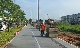 舊圍擋基礎(chǔ)塊回收，綠色施工再提速